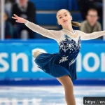 Home 21 벨라루스에서 피겨 스케이팅 선수 - A teenage female figure skater performing a clean triple axel jump on an indoor ice rink, wearing a ...